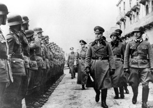 German Field Marshal Gen. Erwin Rommel reviews the crew of a German coastal battery on the English Channel Coast, England, in March 1944 during World War II. (AP Photo)